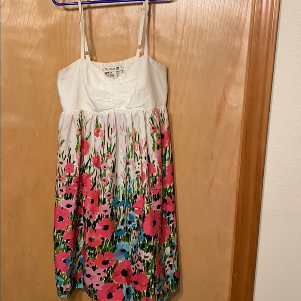 Women’s floral mini spaghetti strap dress.